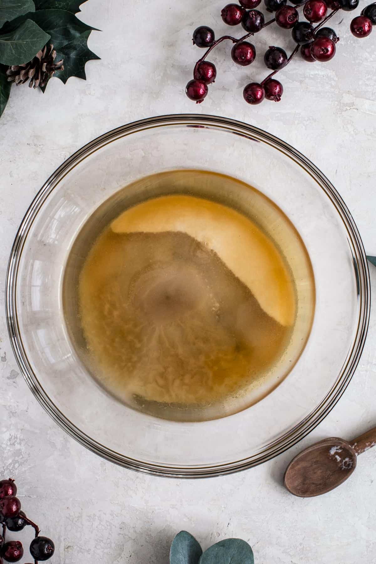 Ingredients in a large mixing bowl for making the syrup for peanut brittle.