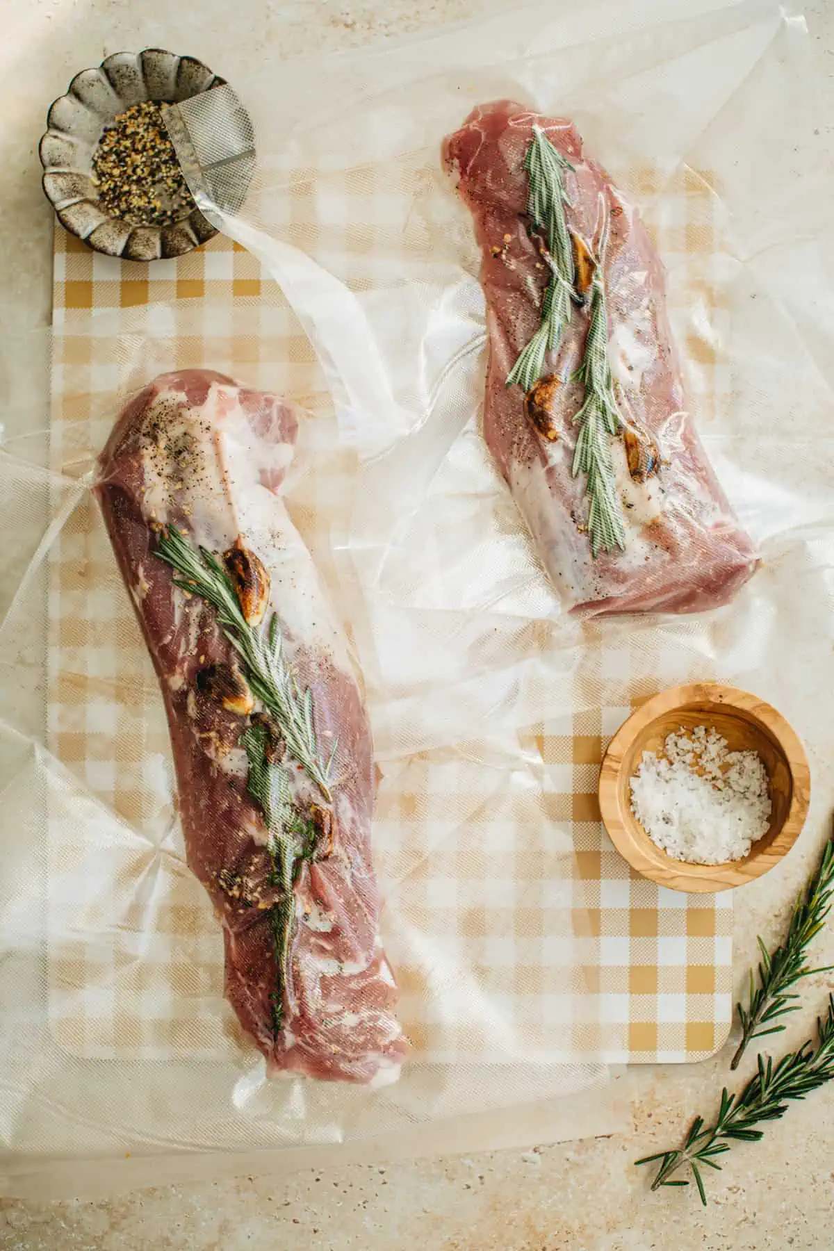 Pork tenderloins in vacuum-sealed bags ready for sous vide cooking.